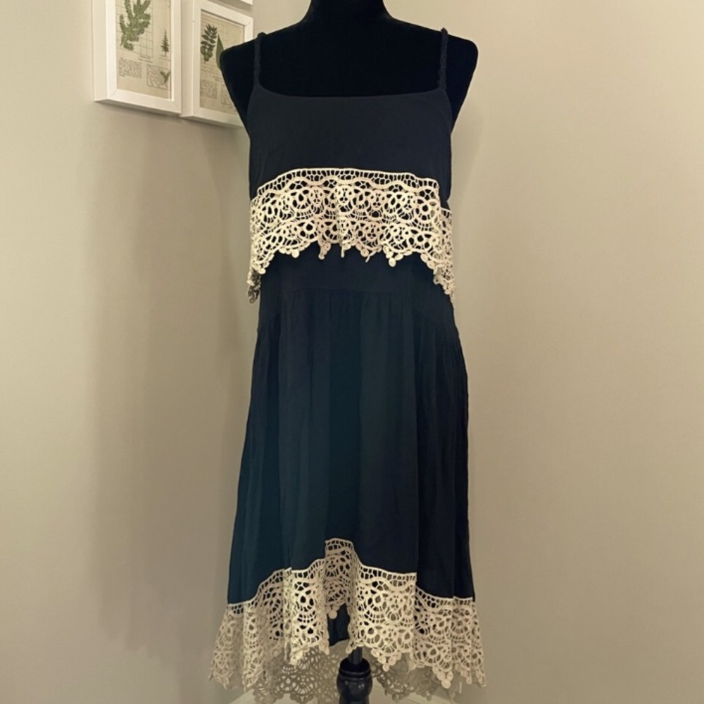 Free People black dress with beautiful lace knit tatted hems it's super cute